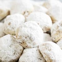 Snowball cookies dusted with powdered sugar.