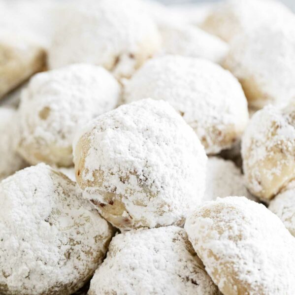Snowball cookies dusted with powdered sugar.