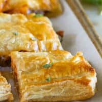 Sausage and Butternut Squash Slab Pie cut into slices.