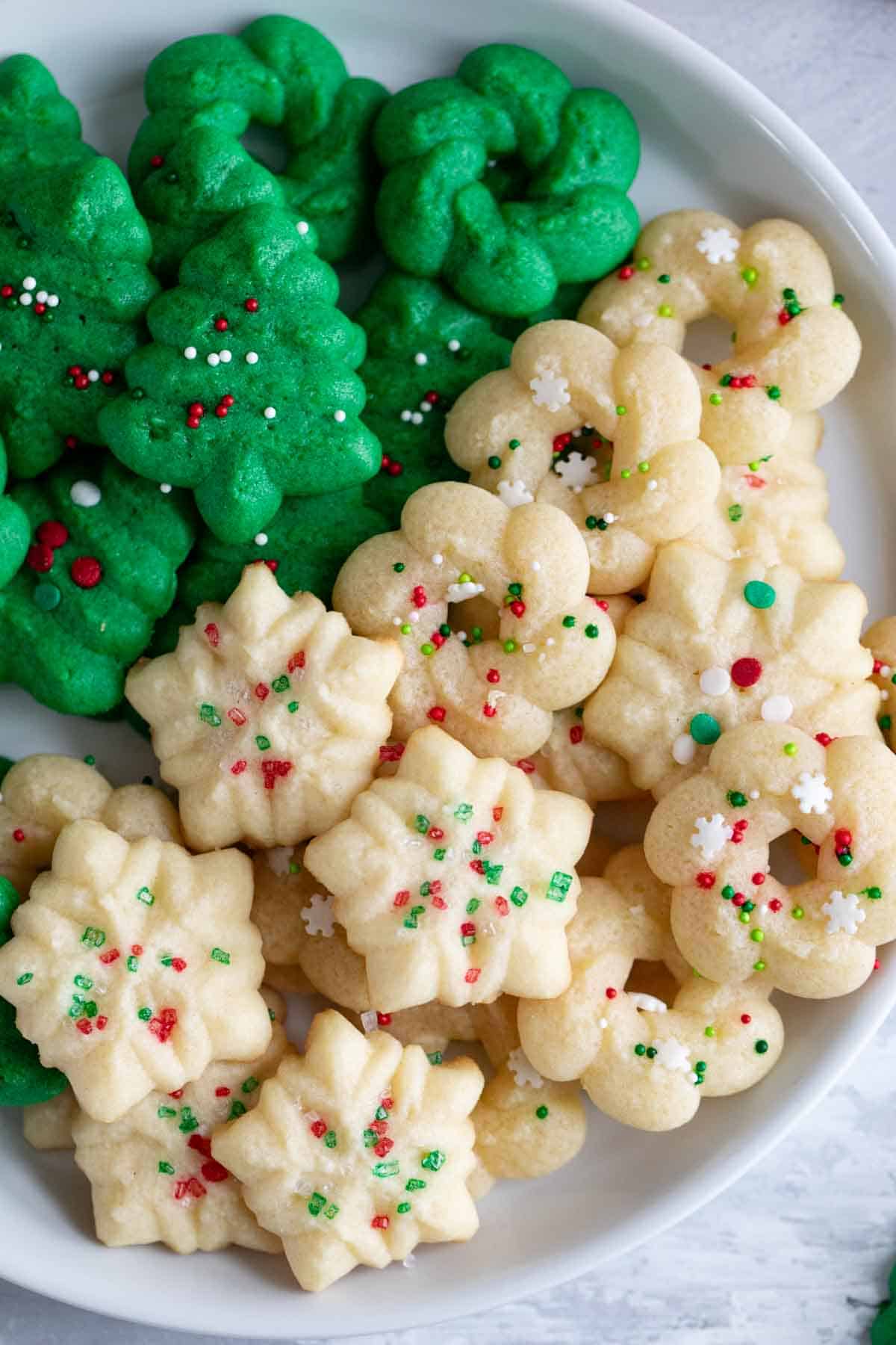Close up of spritz cookies on a plate.