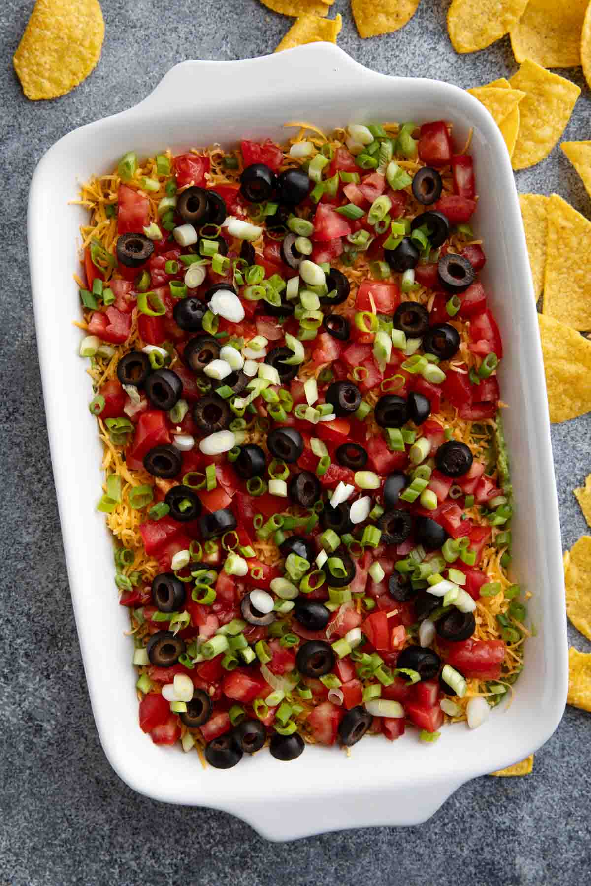 Dish filled with 7 Layer Dip.