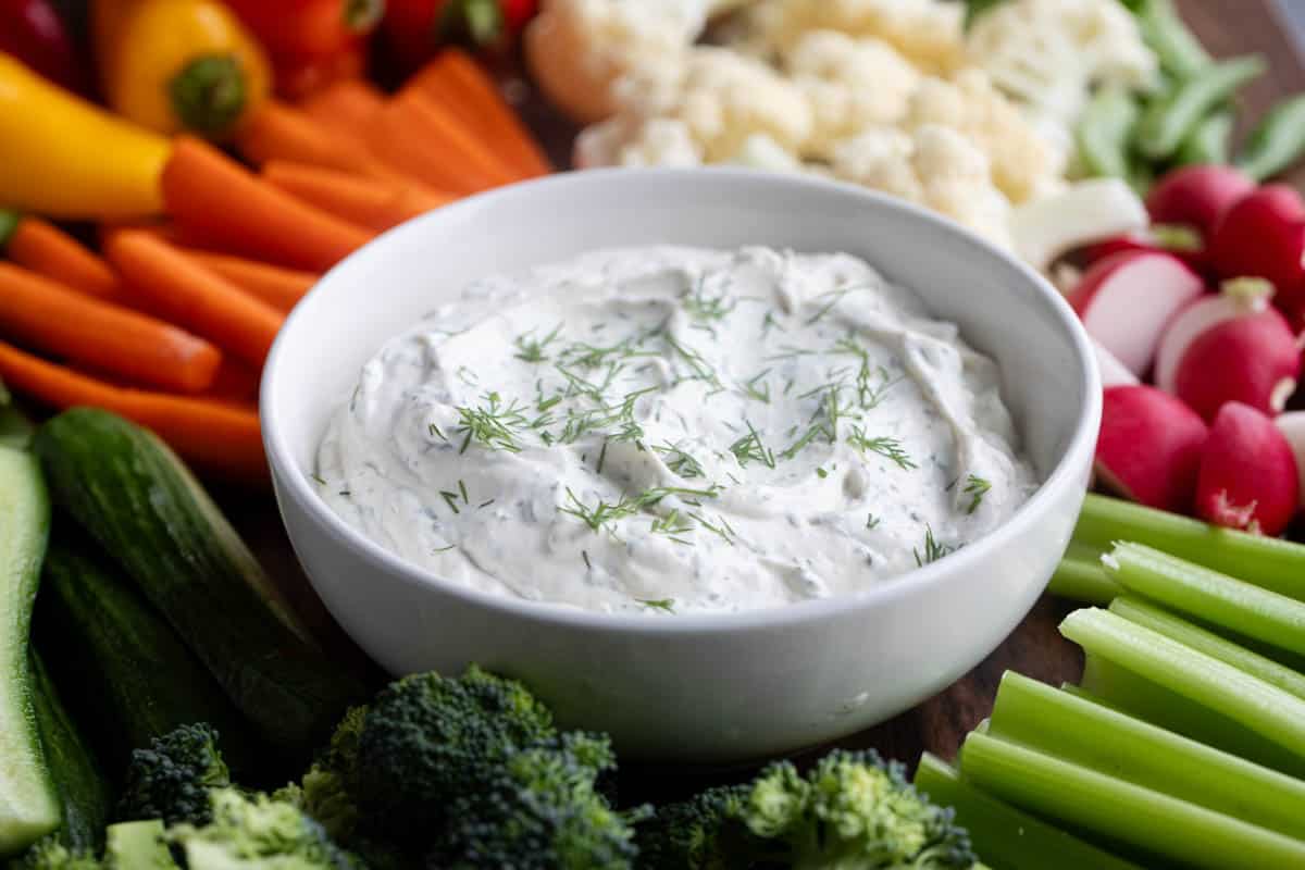 Bowl filled with creamy dill dip - an easy vegetable dip made with only a few ingredients.