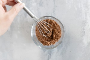 Mixing spices for beef tostadas.