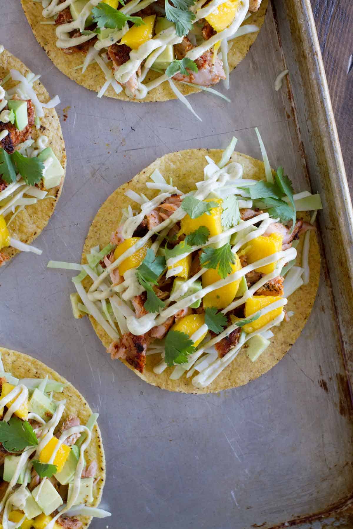 Blackened Salmon Tostadas on a baking sheet.