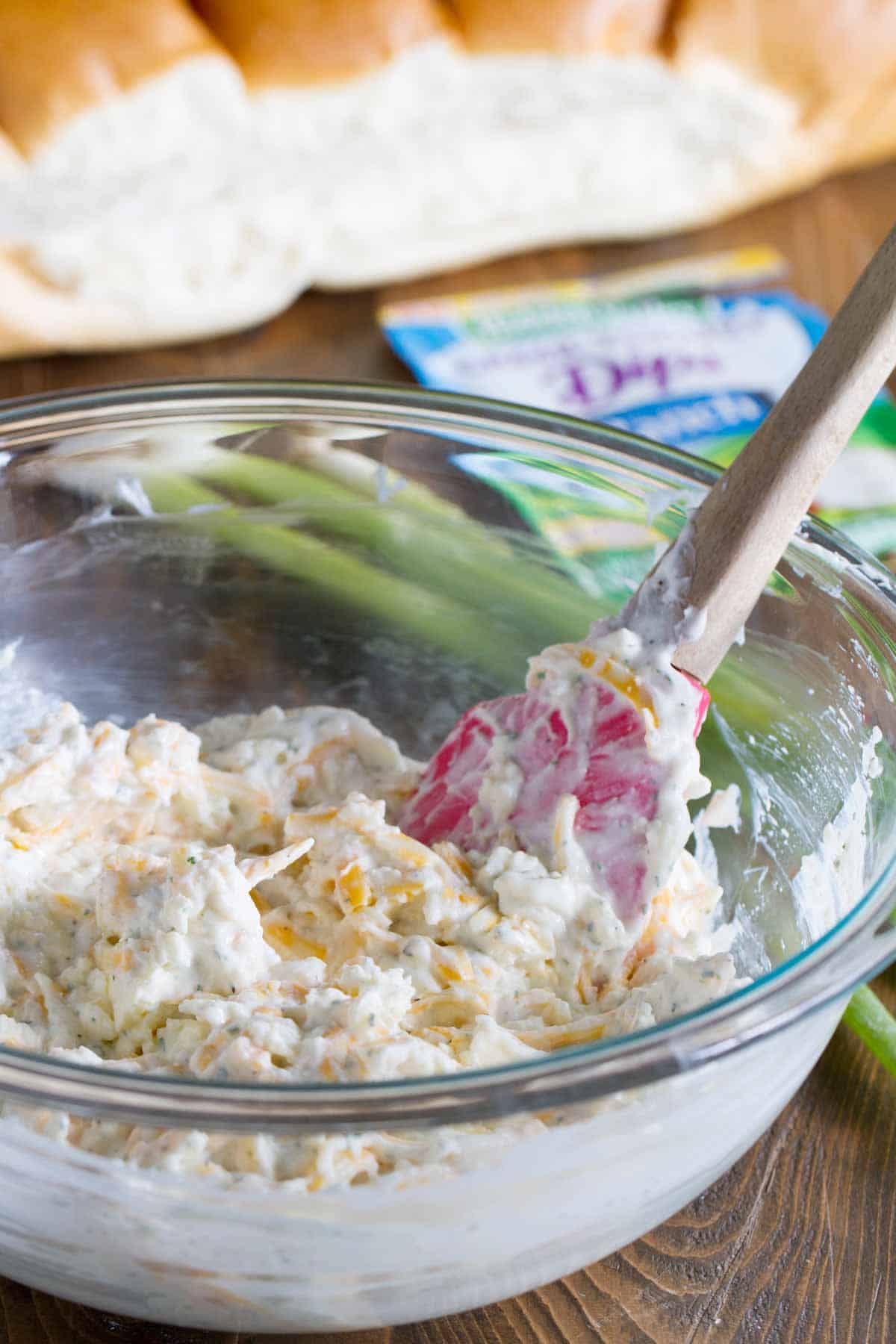 Ingredients for Ranch Cheese Bread combined in a bowl.