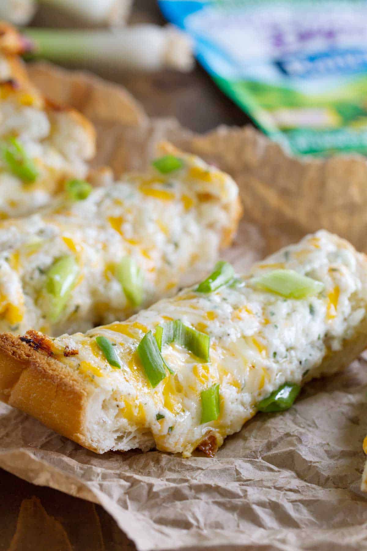 Ranch Cheese Bread slices on brown paper.