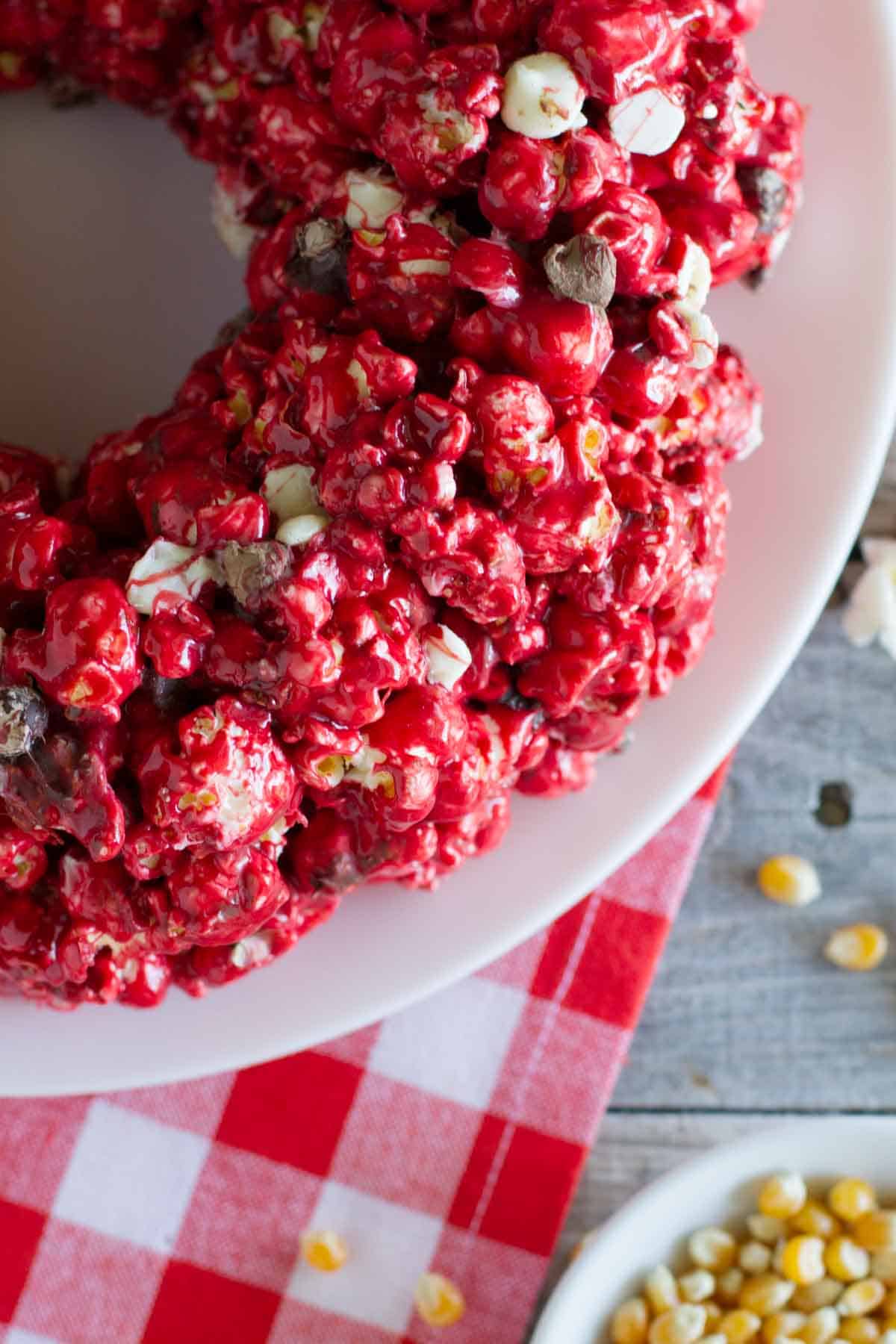 Red velvet popcorn cake with chocolate chips.