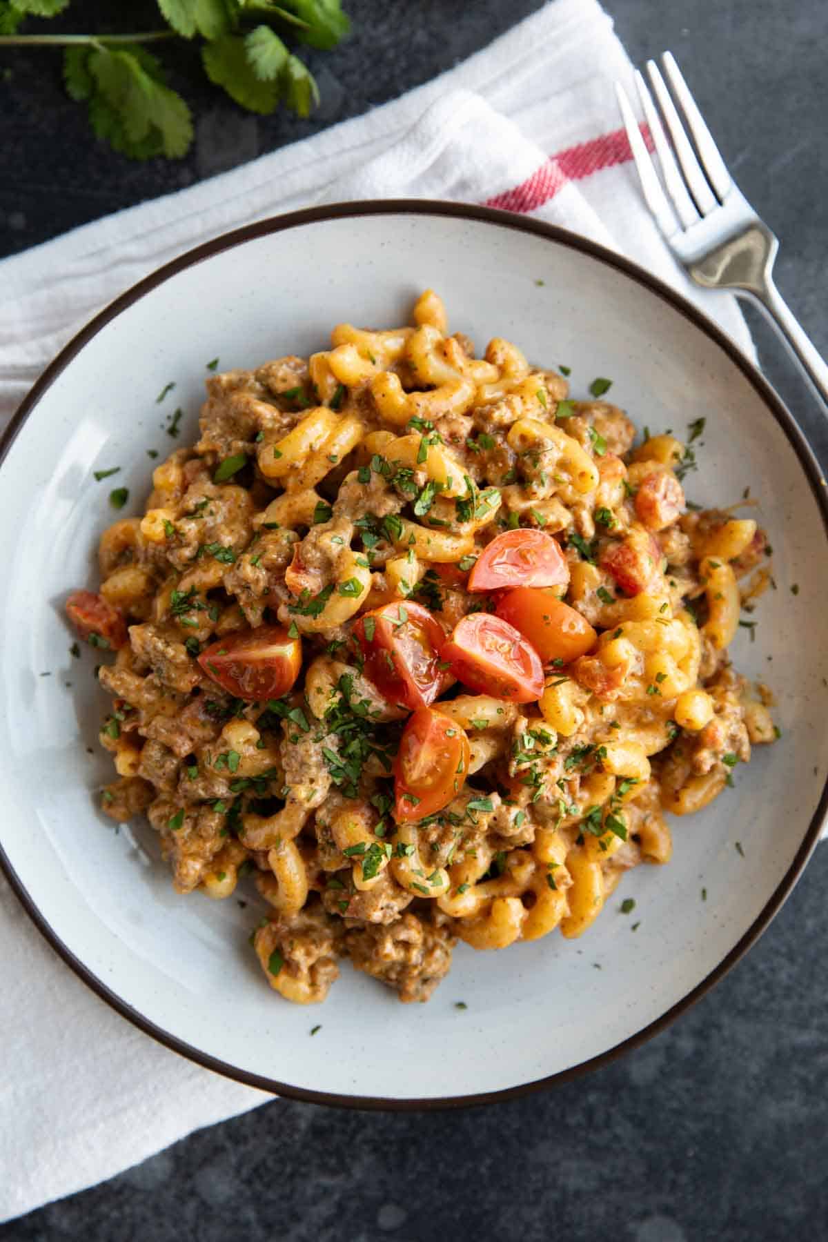 Taco Mac and cheese with ground beef and tomatoes.