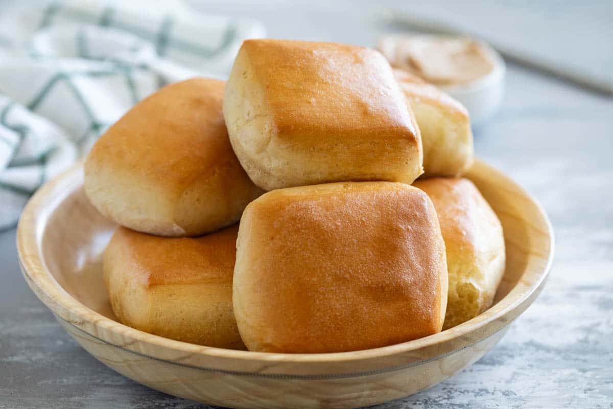 Bowl filled with Texas Roadhouse Rolls.