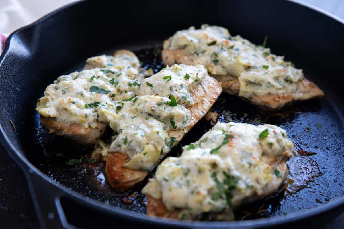 Artichoke Chicken with creamy artichoke topping.