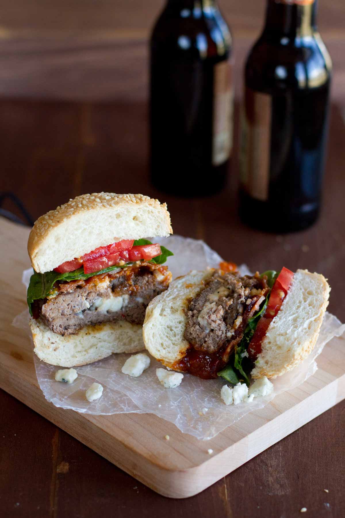 Chipotle Honey BBQ Burger cut in half to show cheese stuffed patty.