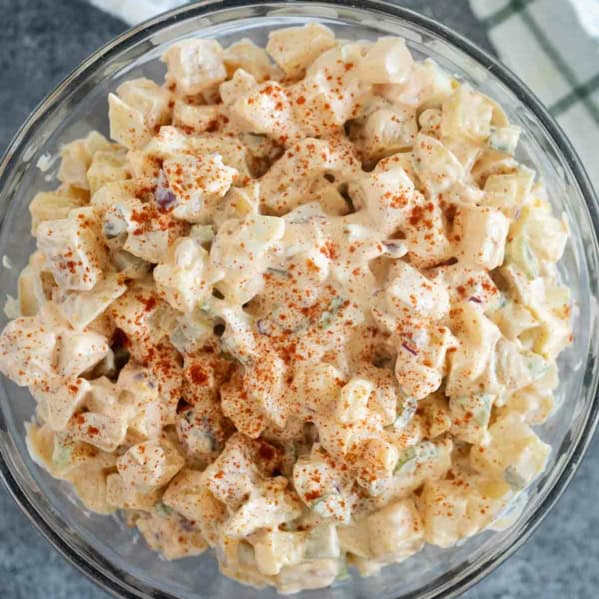 Large bowl of potato salad with smoked paprika.