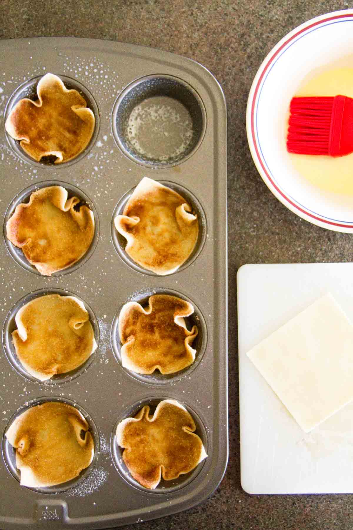 Making sugared wonton shells for Strawberry Wonton Cups.