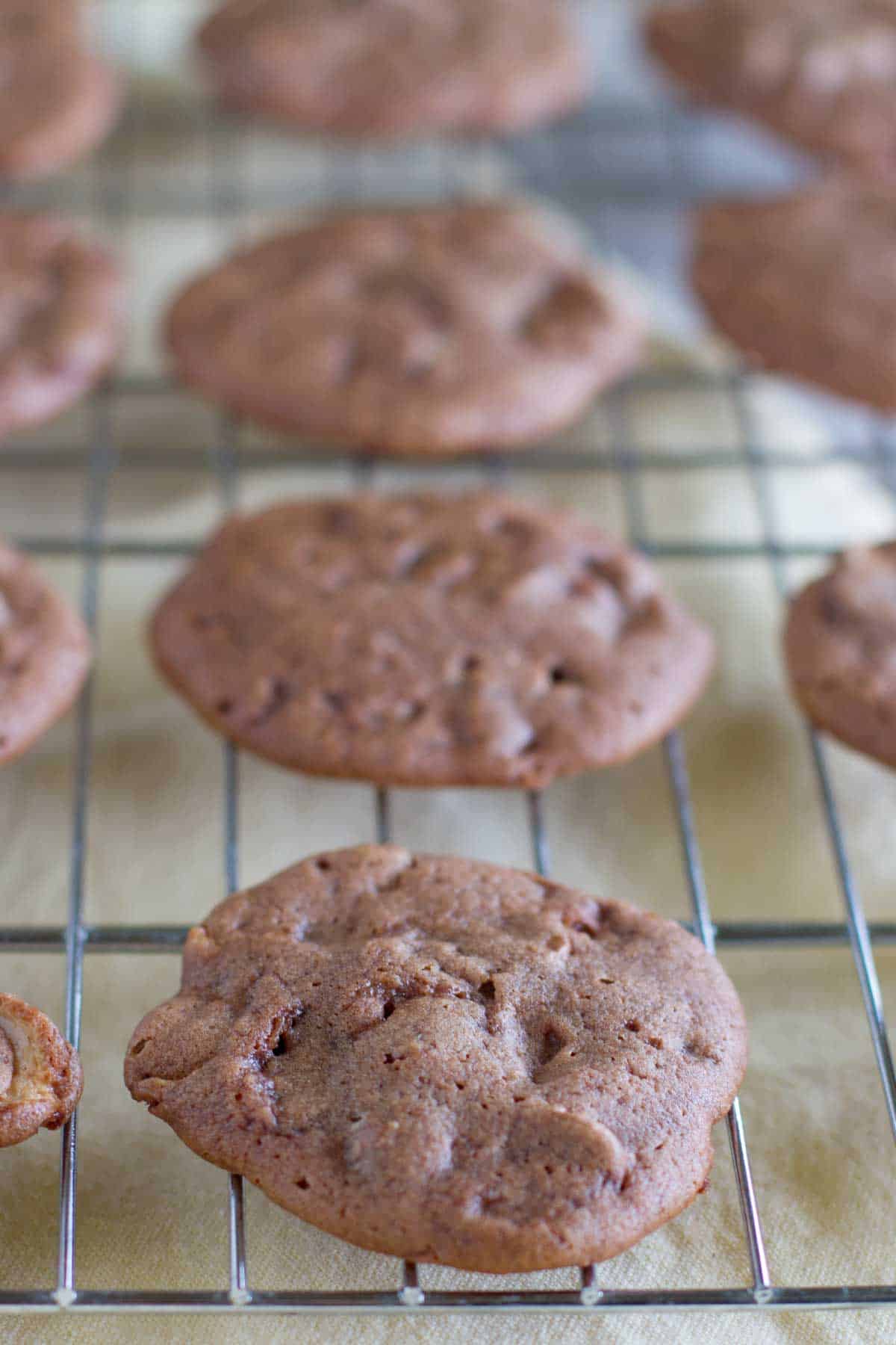 Chocolate Malt Whopper Drops cooling on a cooling rack.