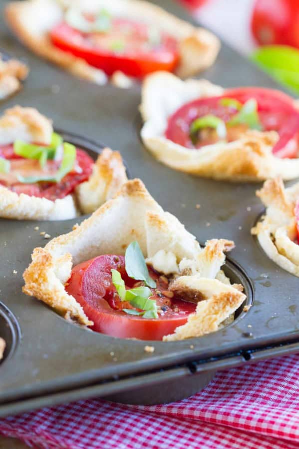 Mini Caprese Tarts made in a muffin tin.