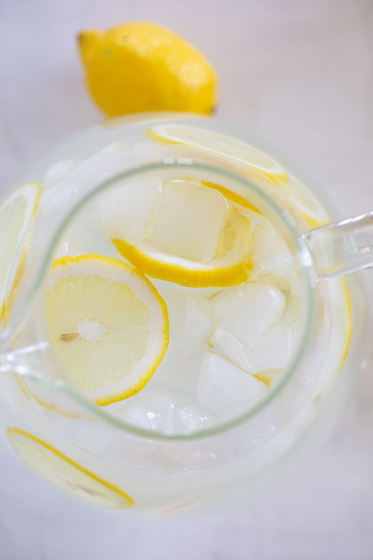 Pitcher full of sweet lemon water.