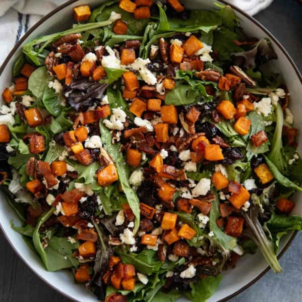 Fall Harvest Salad with roasted butternut squash and apple cider vinegar vinaigrette.