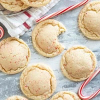 Peppermint snickerdoodles with a bite taken from one.