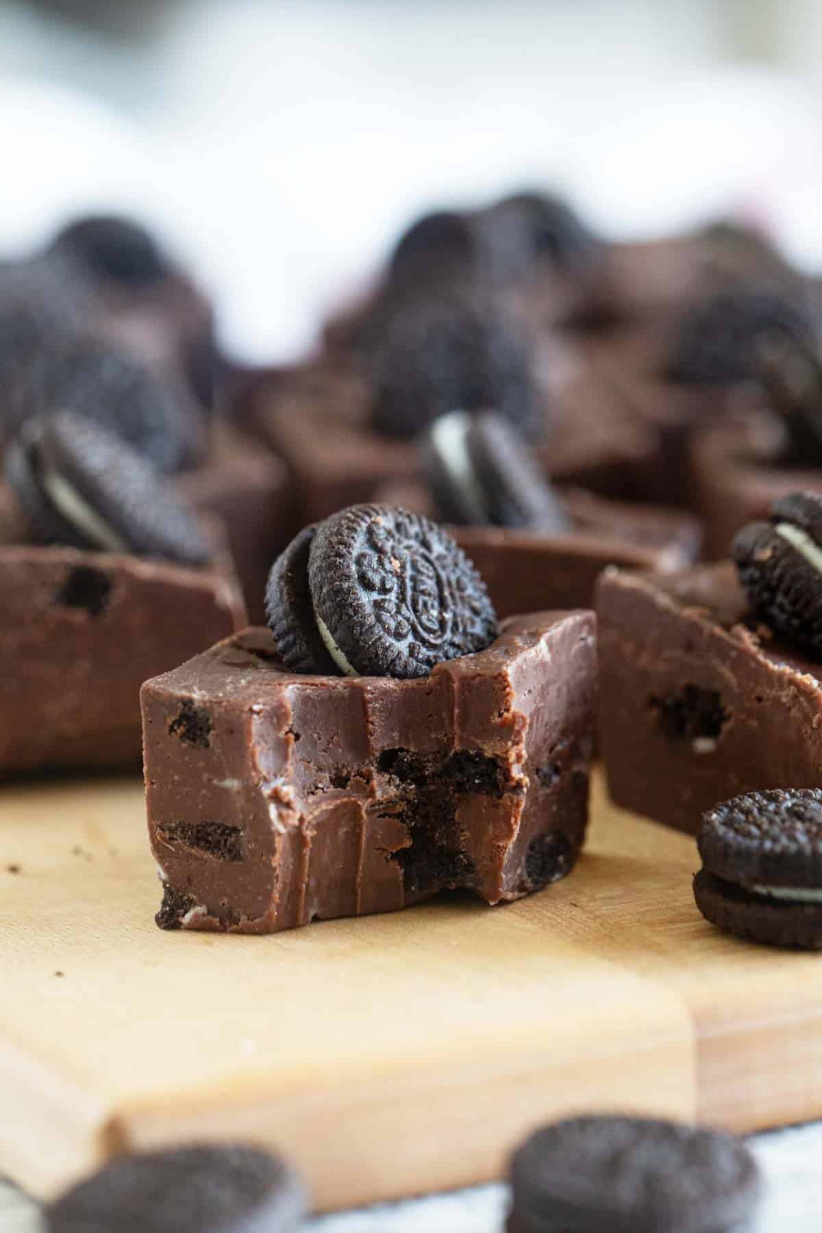 Piece of Oreo Fudge with a bite taken from it.