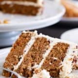 Slice of carrot cake with text overlay bar.