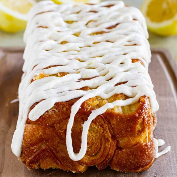 Loaf of Lemon Roll Pull Apart Bread with icing on top.