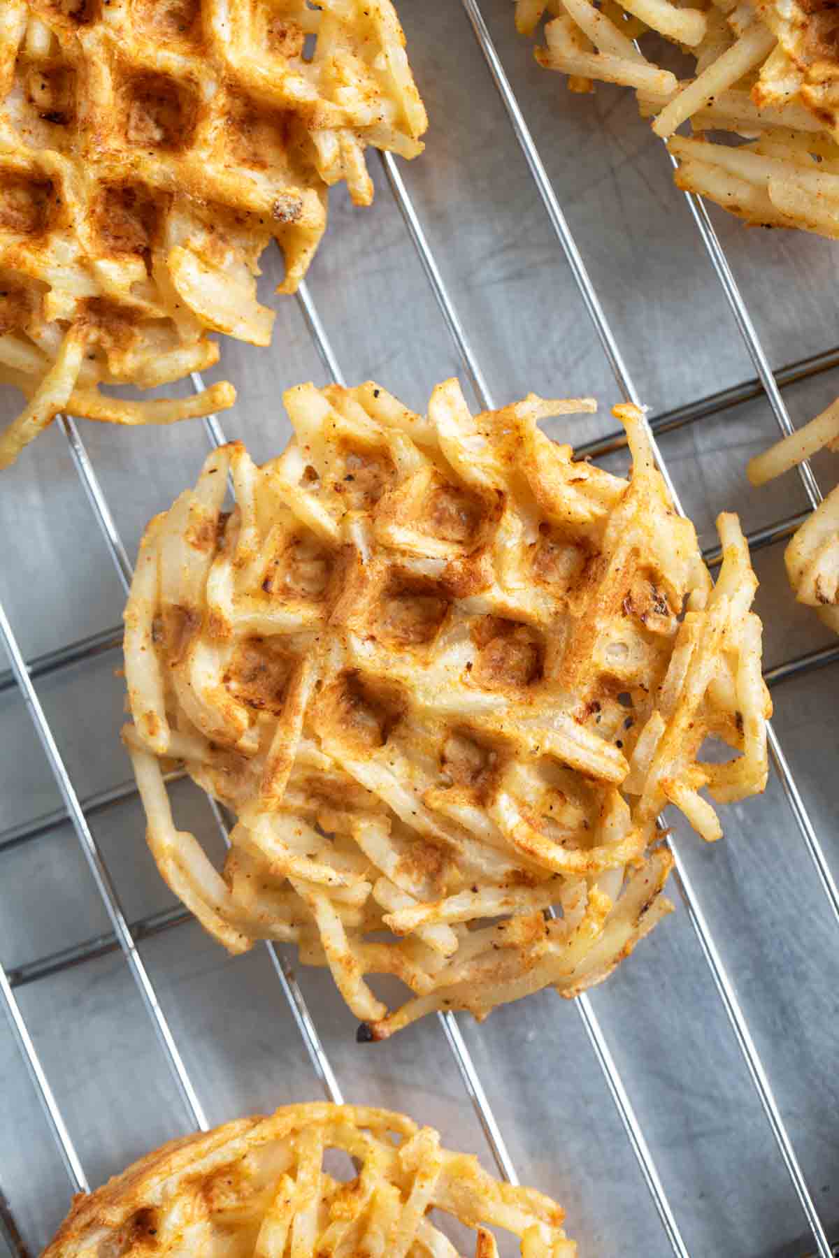 Hash Brown Waffles on a cooling rack.