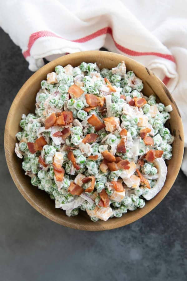 Pea Salad with bacon and cheese in a large bowl.