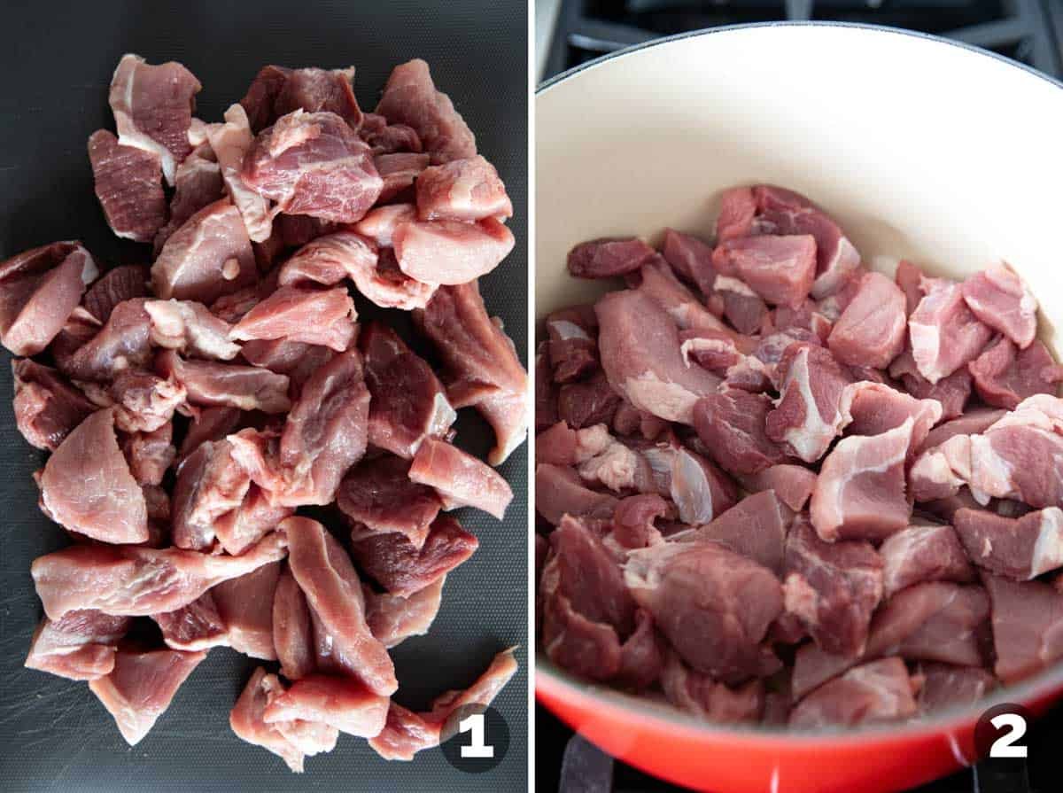 Cutting pieces of pork and adding to a Dutch oven.