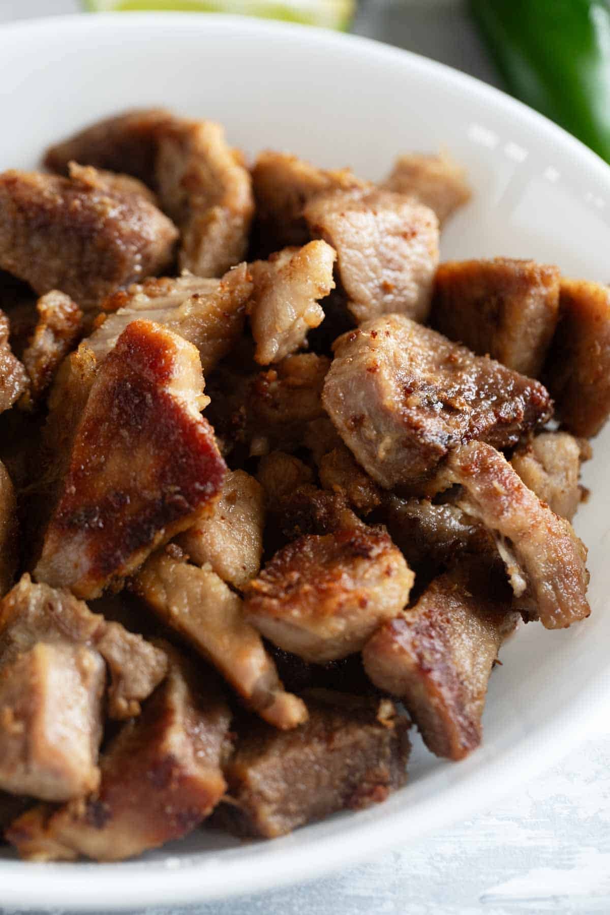Close up of pieces of Pork Carnitas.