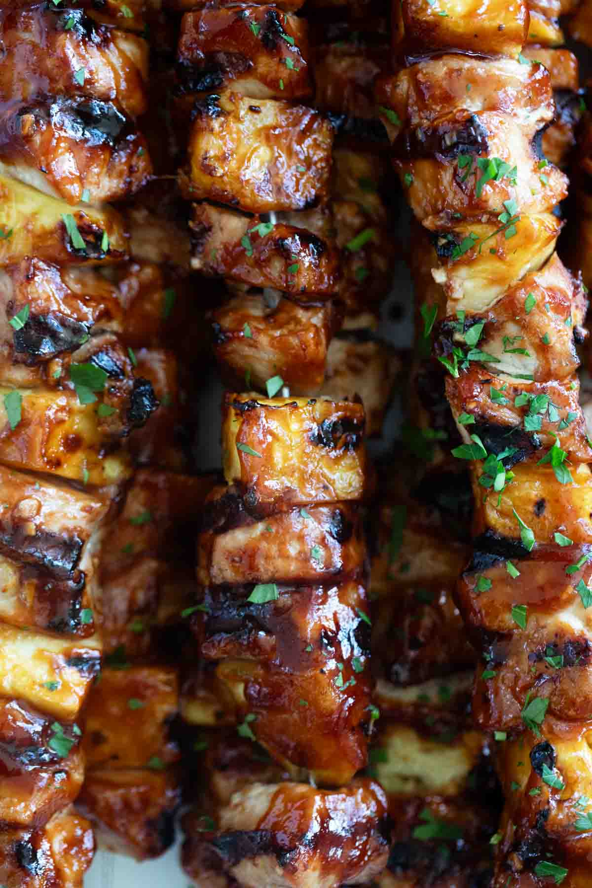 BBQ Pork Kabobs with fresh pineapple and parsley.