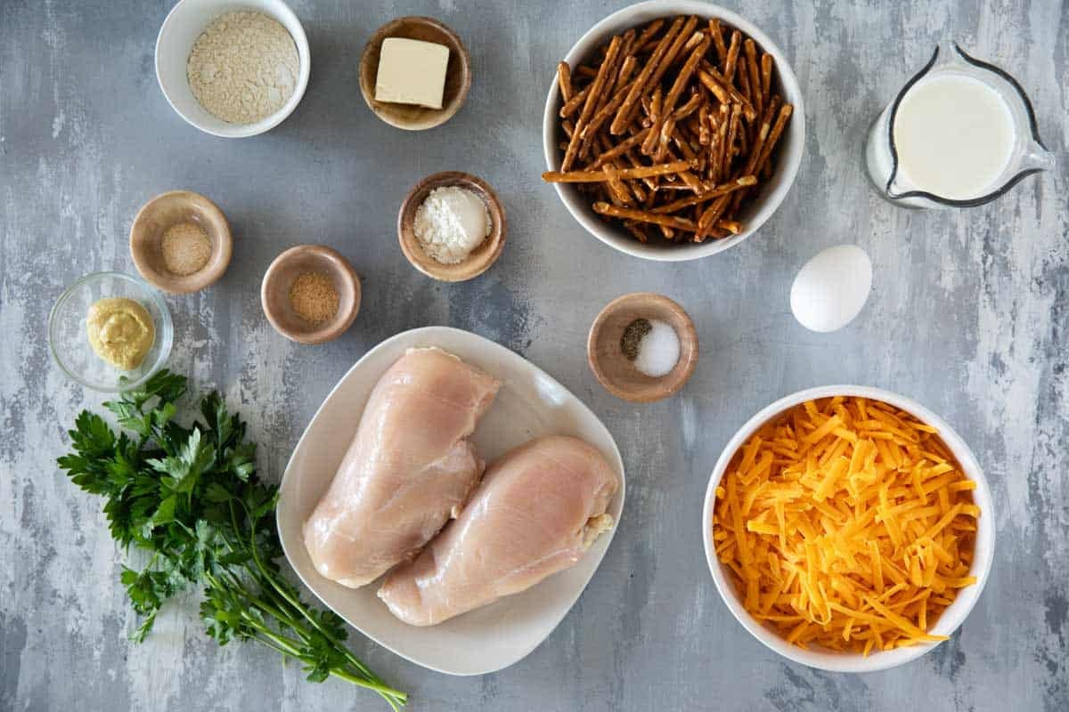 Ingredients to make Pretzel Crusted Chicken and mustard cheddar sauce.