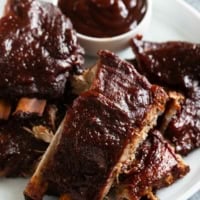 Slow Cooker Ribs covered in bbq sauce.