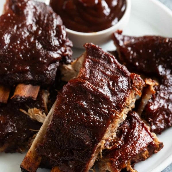 Slow Cooker Ribs covered in bbq sauce.