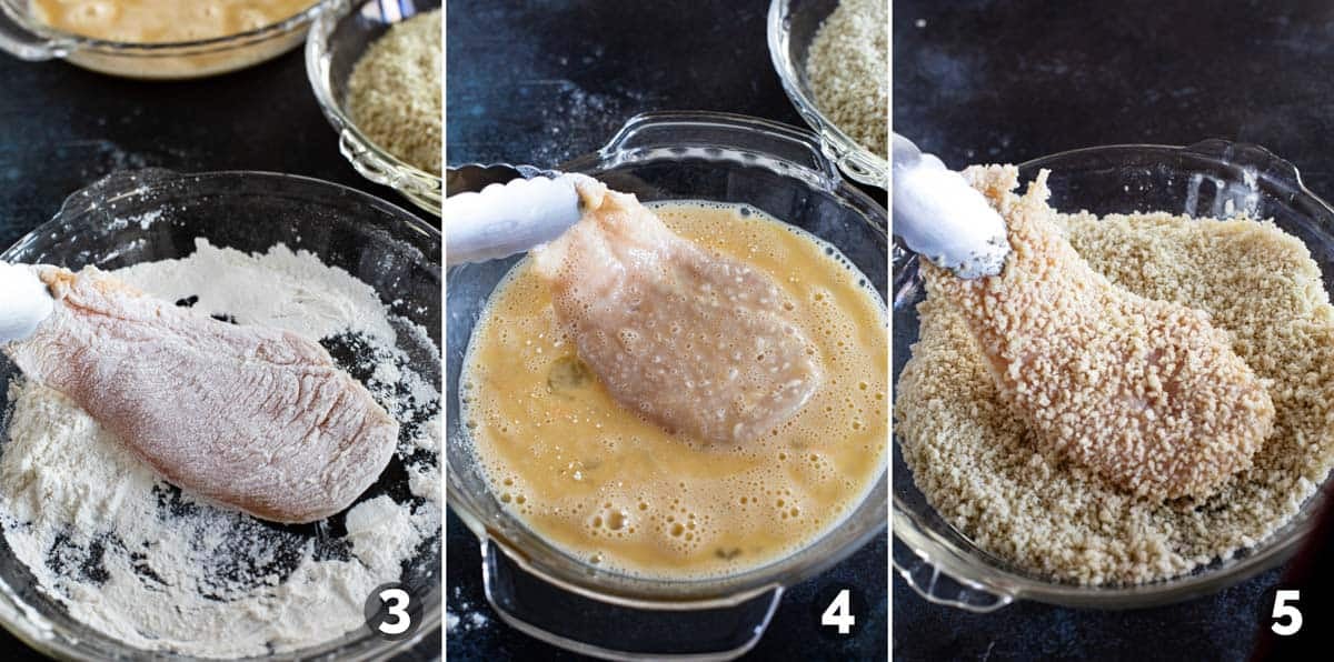 Coating chicken breasts with flour, egg, and breadcrumbs before frying.