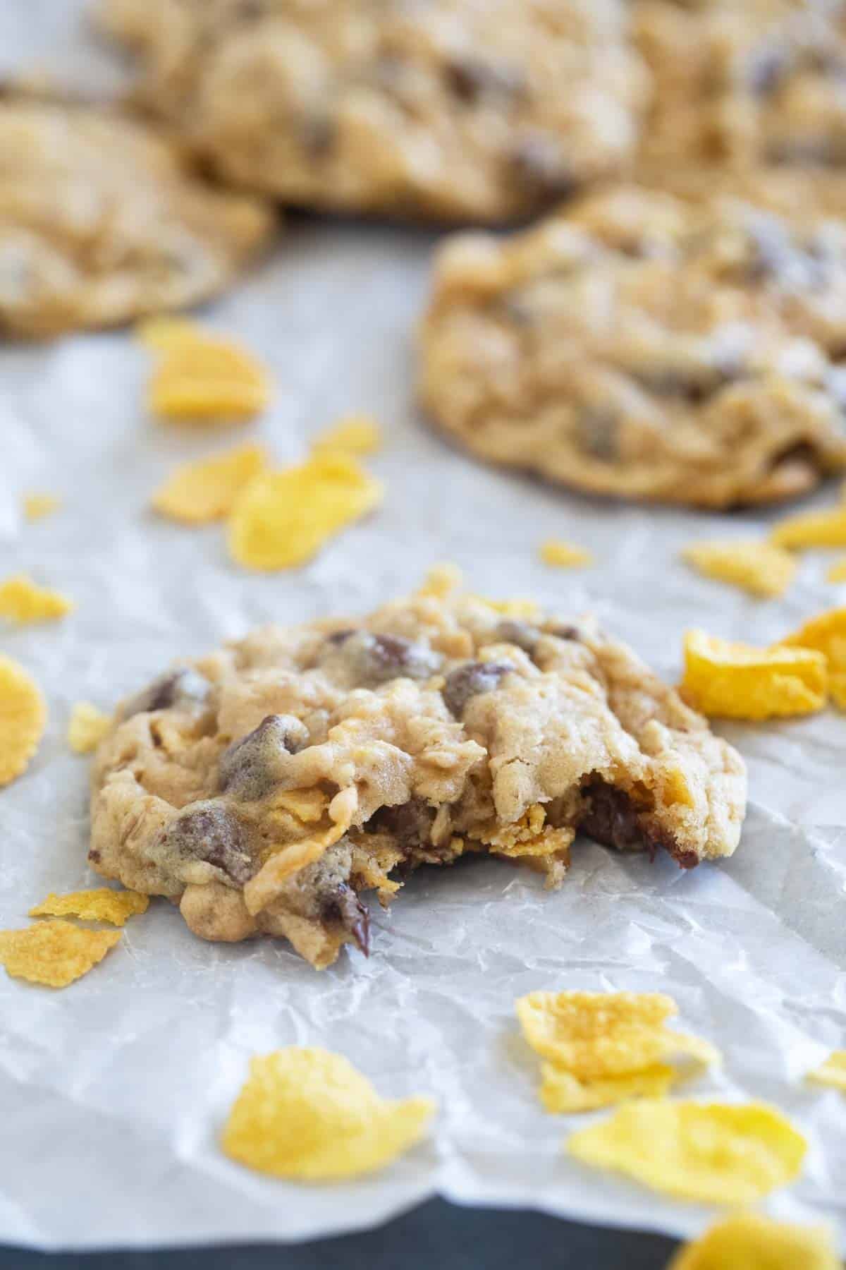 Cornflake Cookie with a bite taken from it.