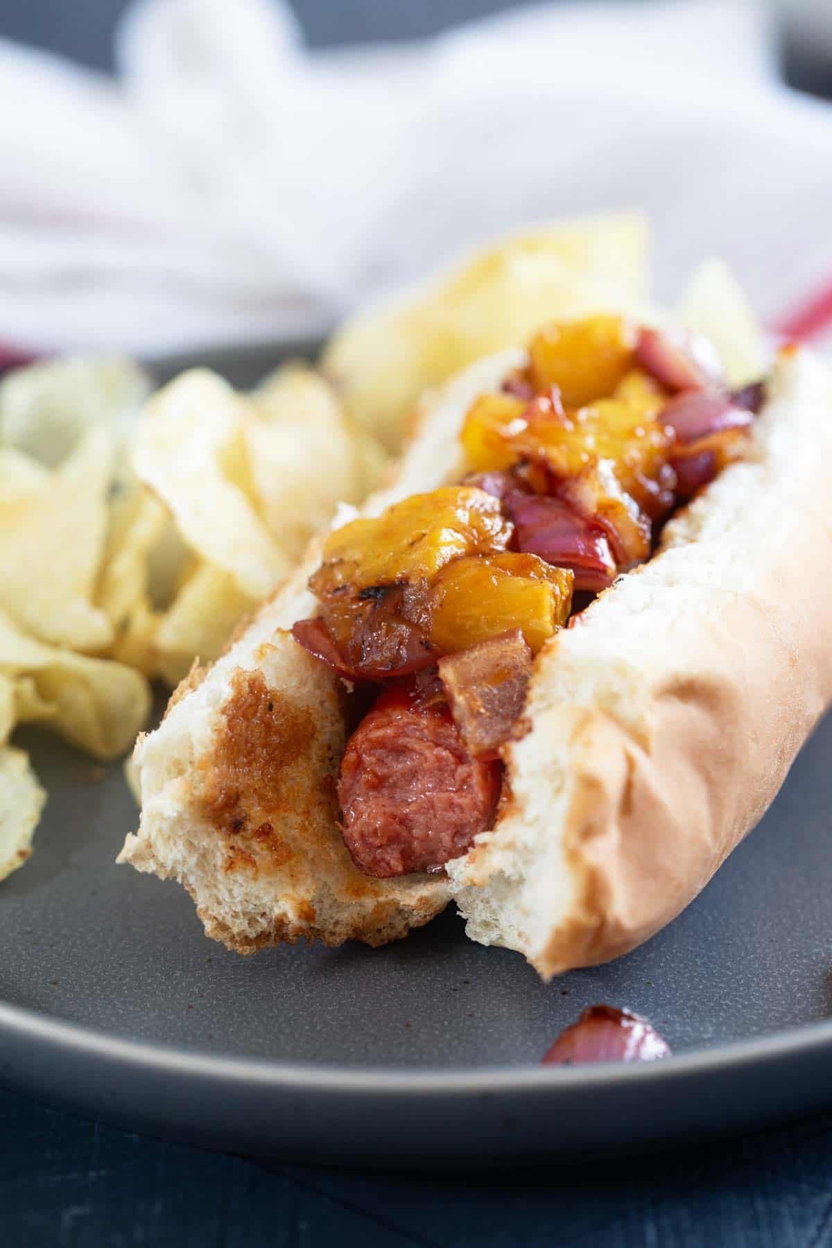 Hawaiian Hot Dog with a bite taken from it.