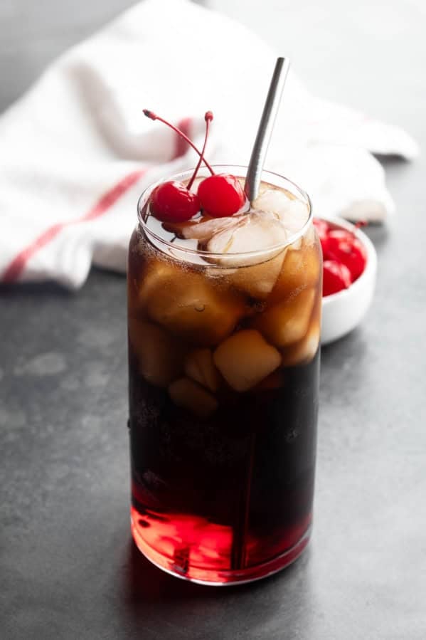 Roy Rogers Drink with grenadine and cola and maraschino cherries.