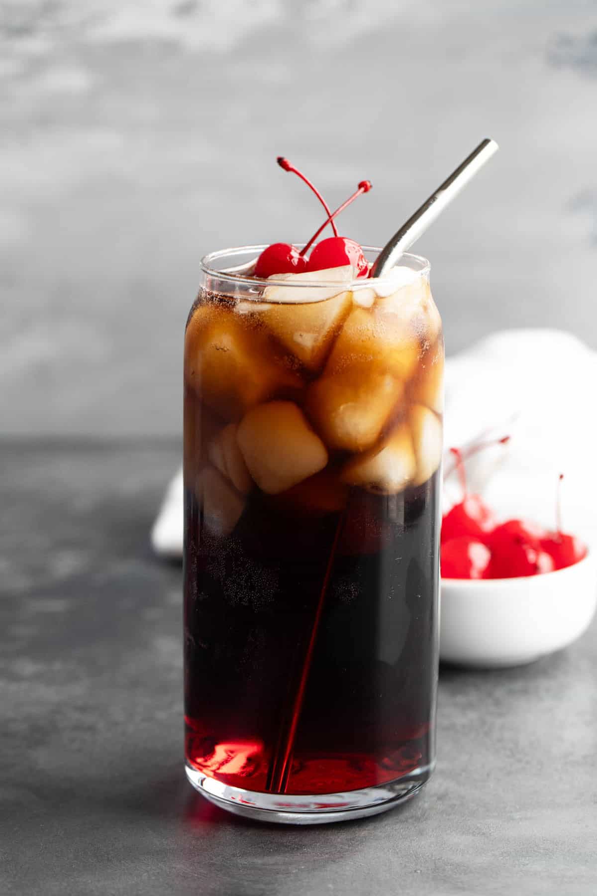 Roy Rogers Drink with a metal straw.