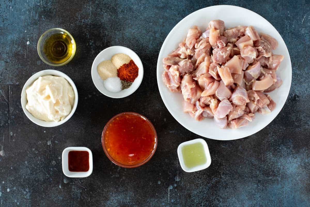 Ingredients to make Bang Bang Chicken Skewers.