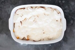 Cake mix sprinkled over peaches for dump cake.