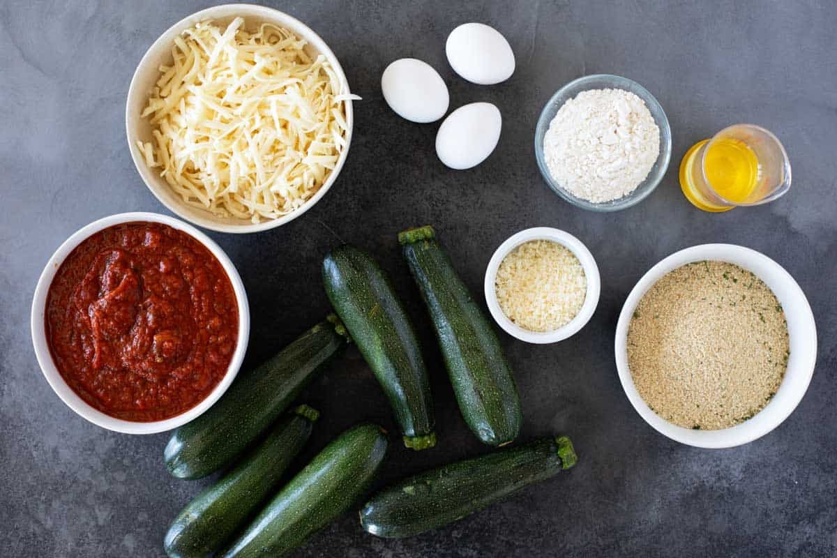 Ingredients to make Zucchini Parmesan.