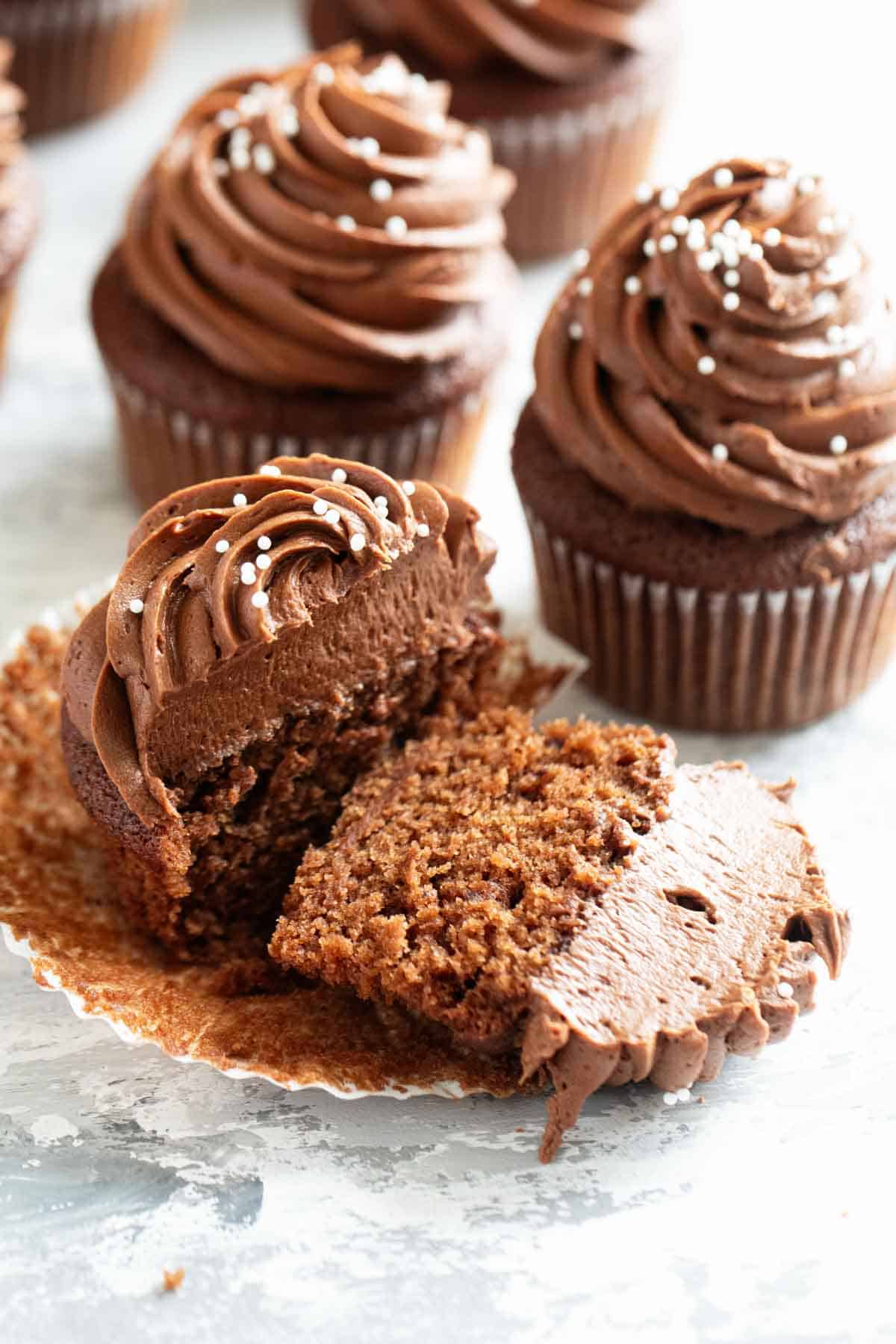 Eggless Chocolate Cupcake cut in half to show texture.
