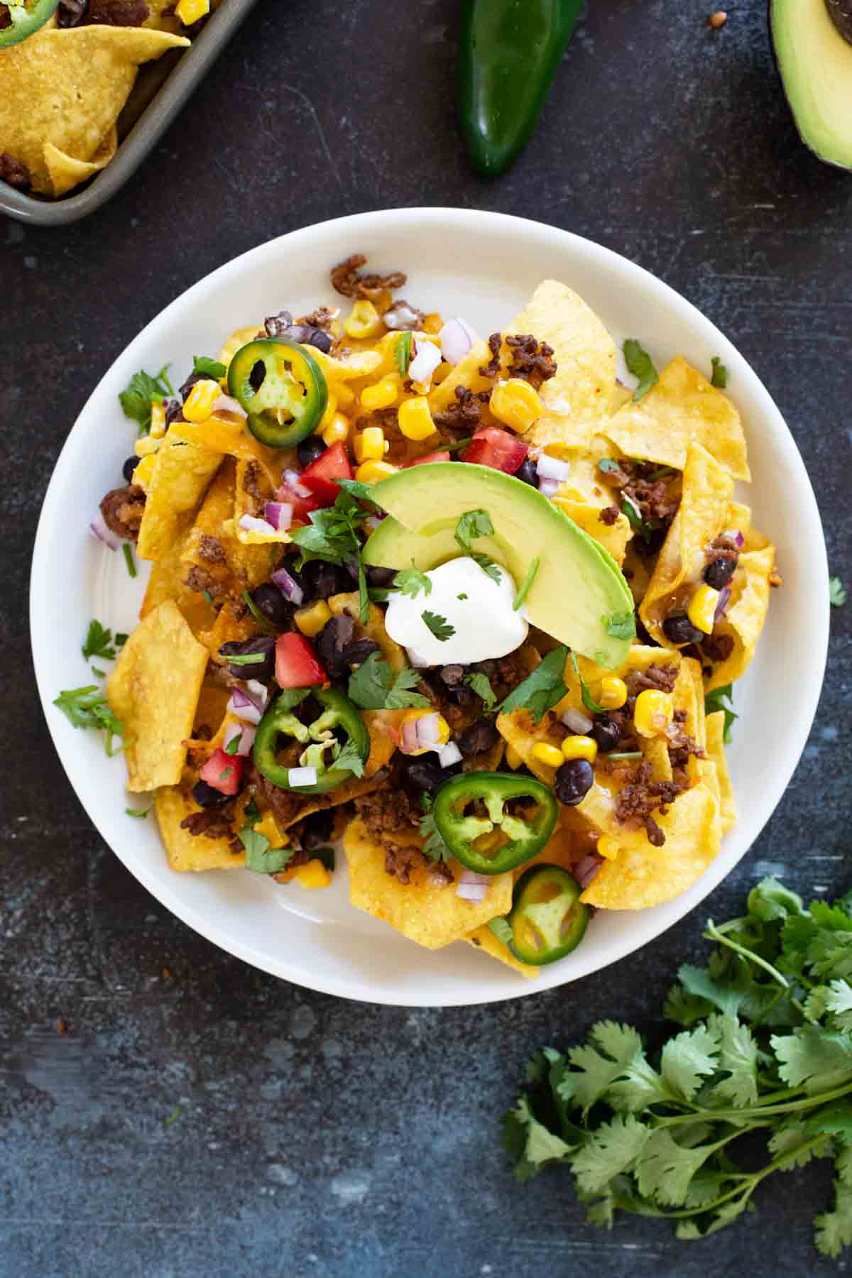 Plate with a serving of Sheet Pan Nachos.