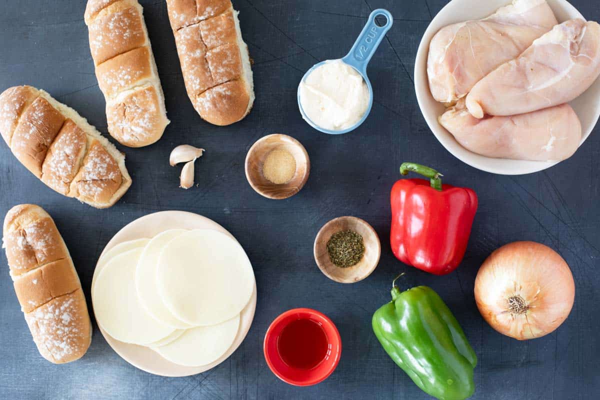 Ingredients for Chicken Cheesesteak Sandwiches.