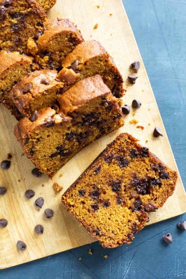 Loaf of Pumpkin Chocolate Chip Bread cut into slices.