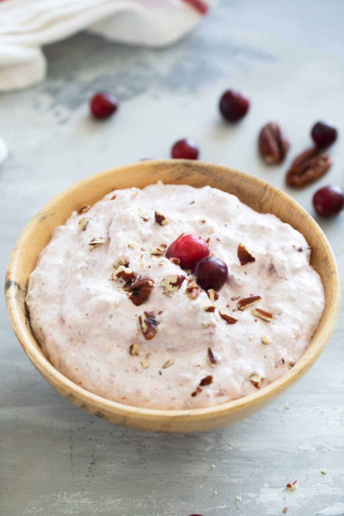 Wooden bowl with Cranberry Salad.