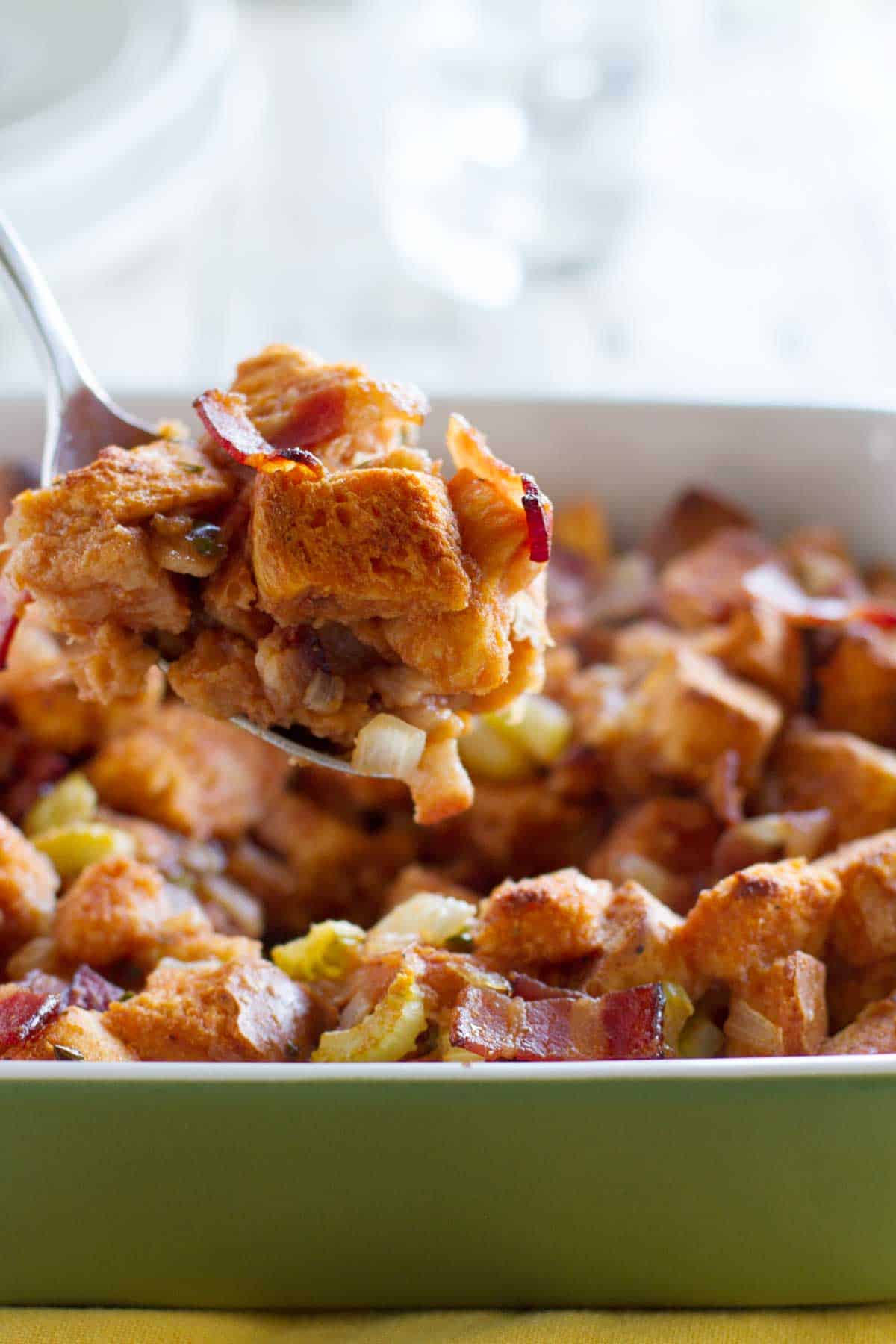 Scooping out a serving of BBQ Bacon Stuffing.