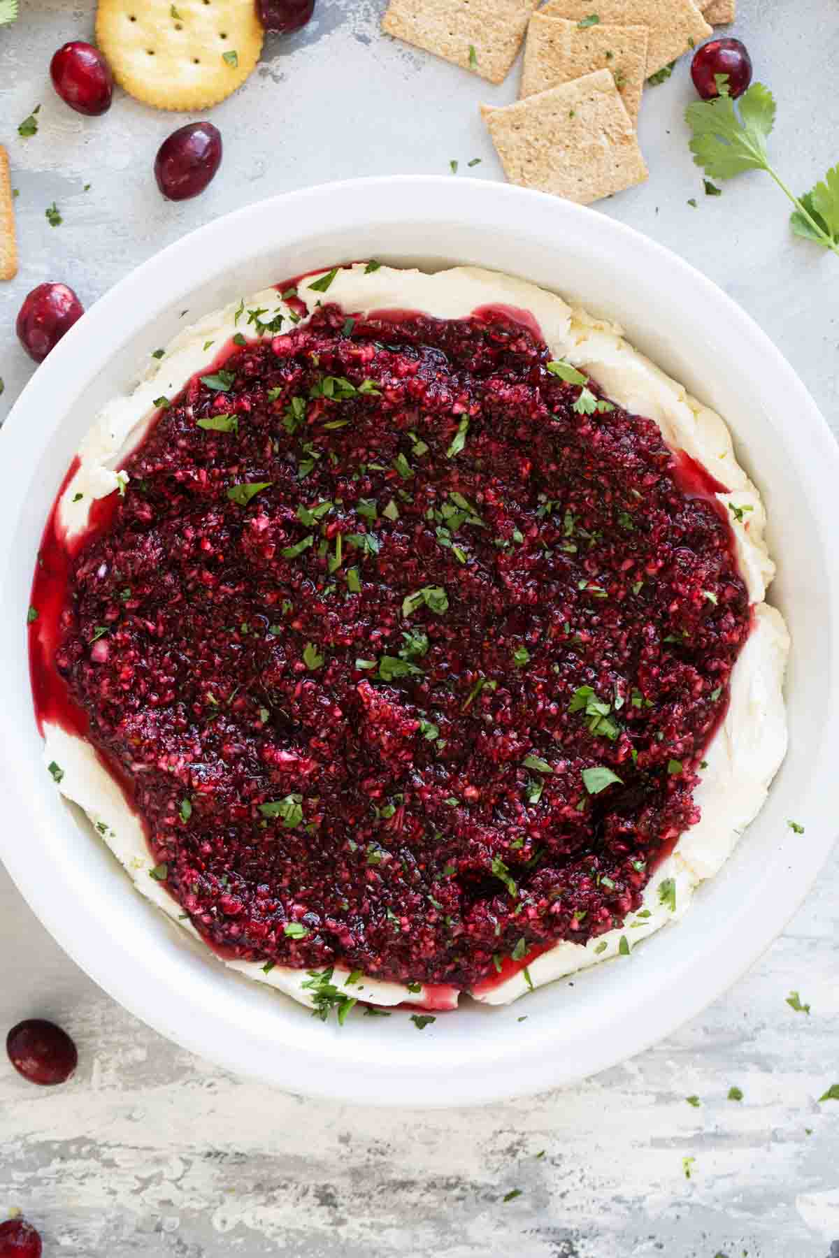 Cranberry Cream Cheese Dip in a white pie dish.