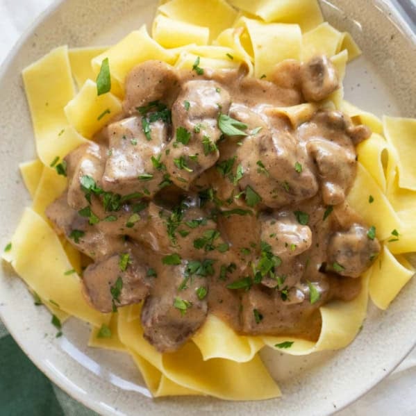 Slow Cooker Beef Stroganoff over egg noodles.