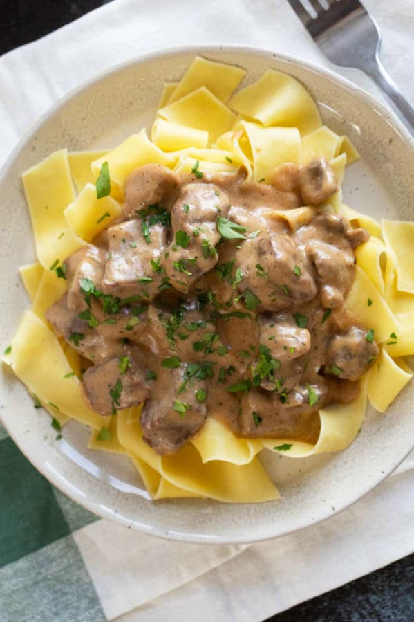 Slow Cooker Beef Stroganoff over egg noodles.